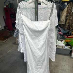 White silk dress jeweled studded cross straps and bows in the back